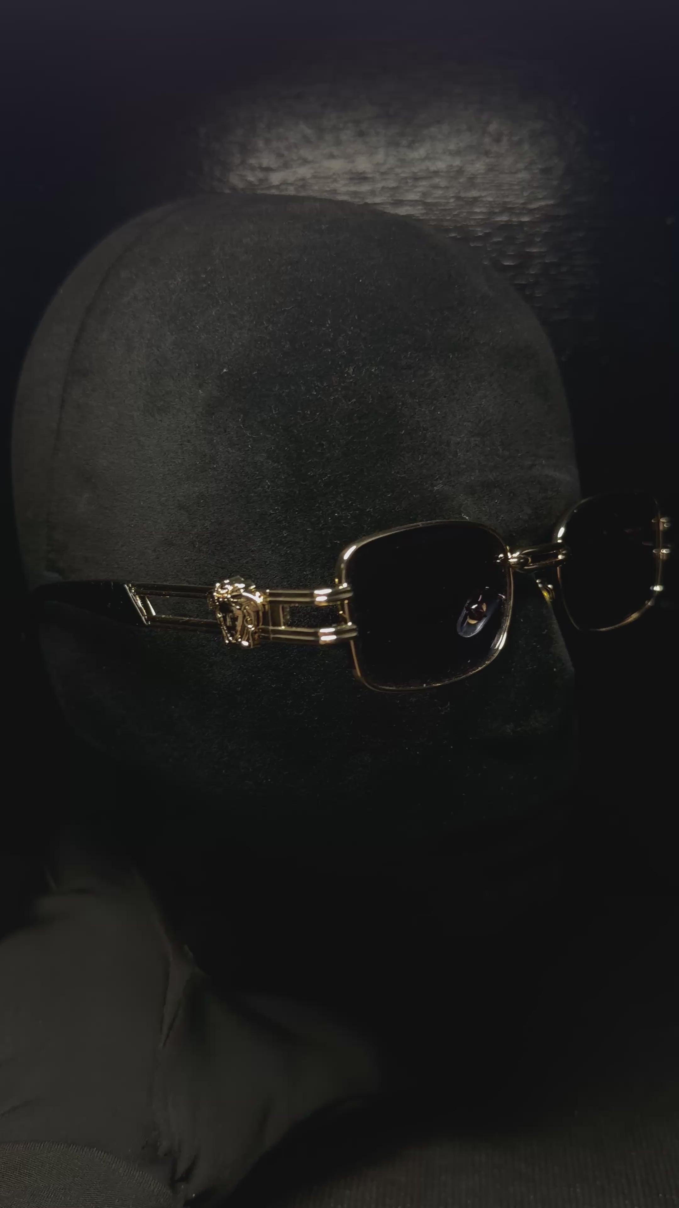 VERSACE Gafas negro montura dorada