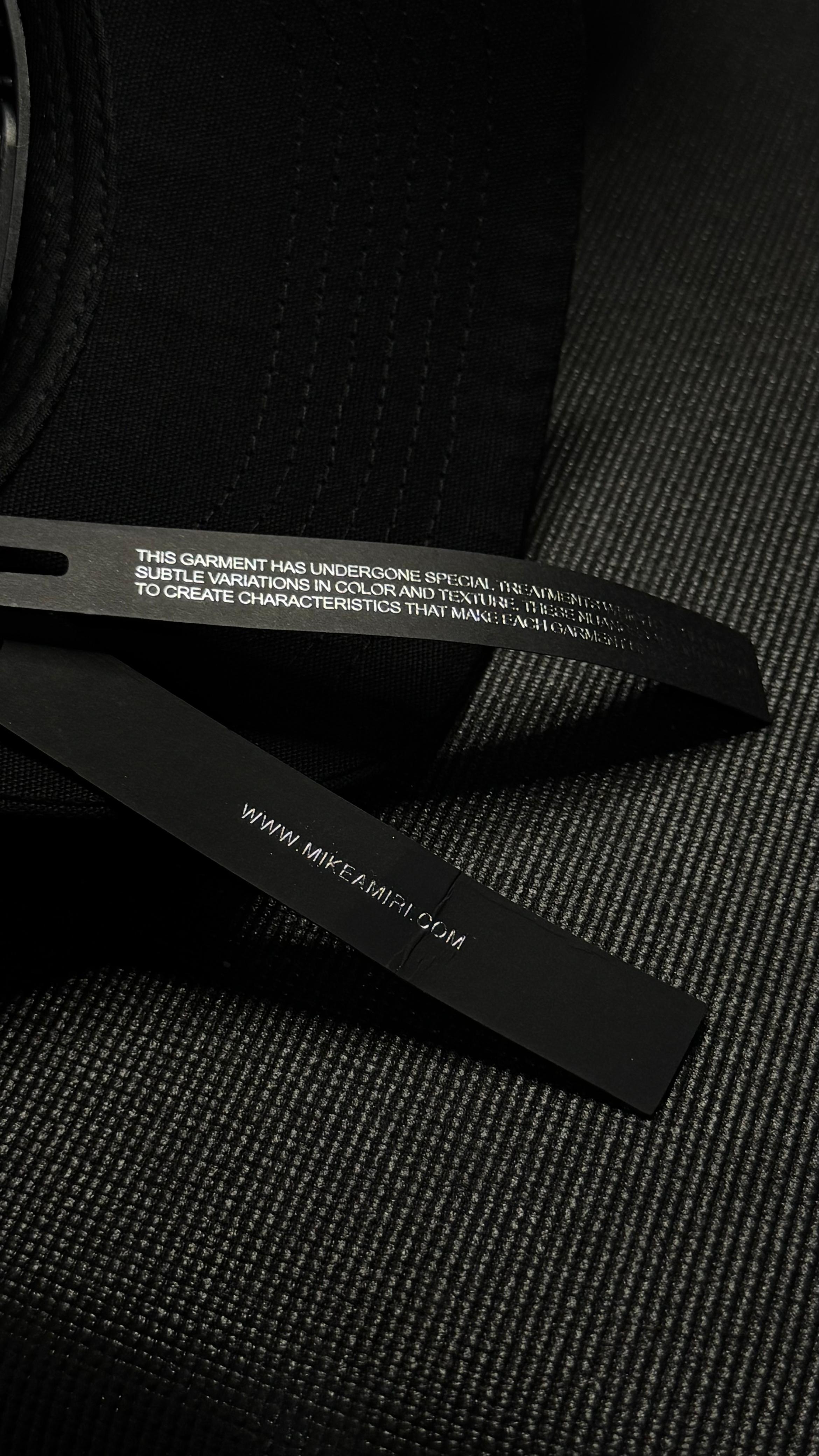 AMIRI DRIP CORE en negro