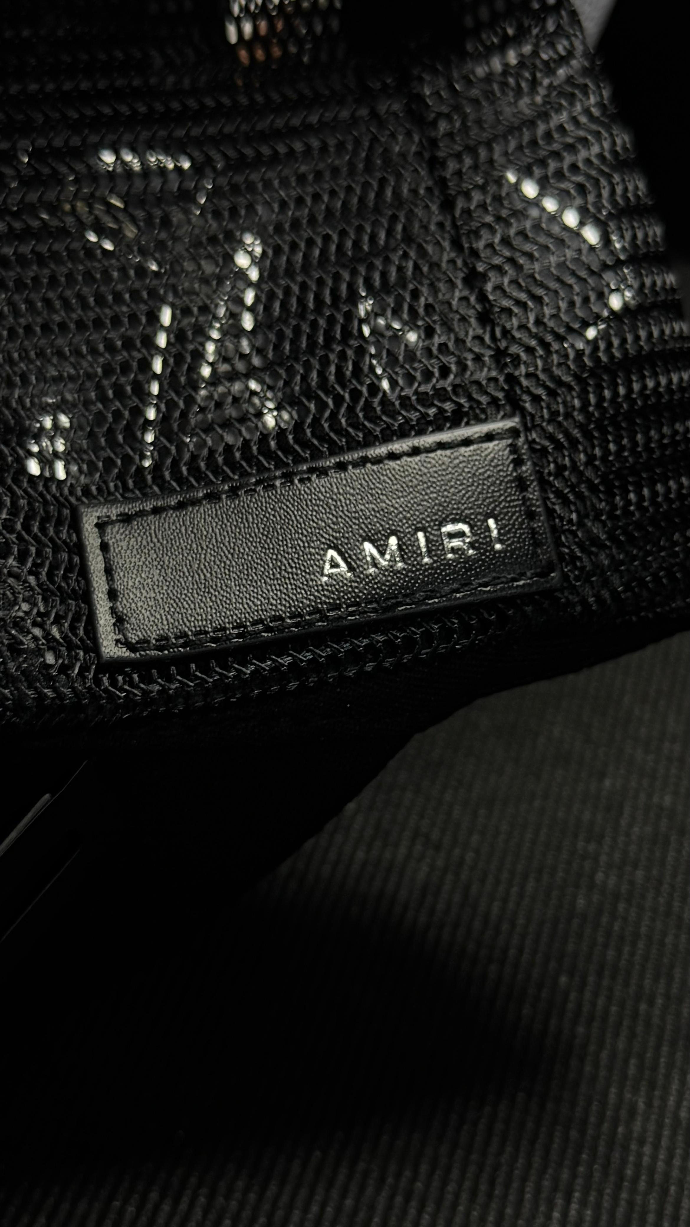 AMIRI DRIP CORE en negro